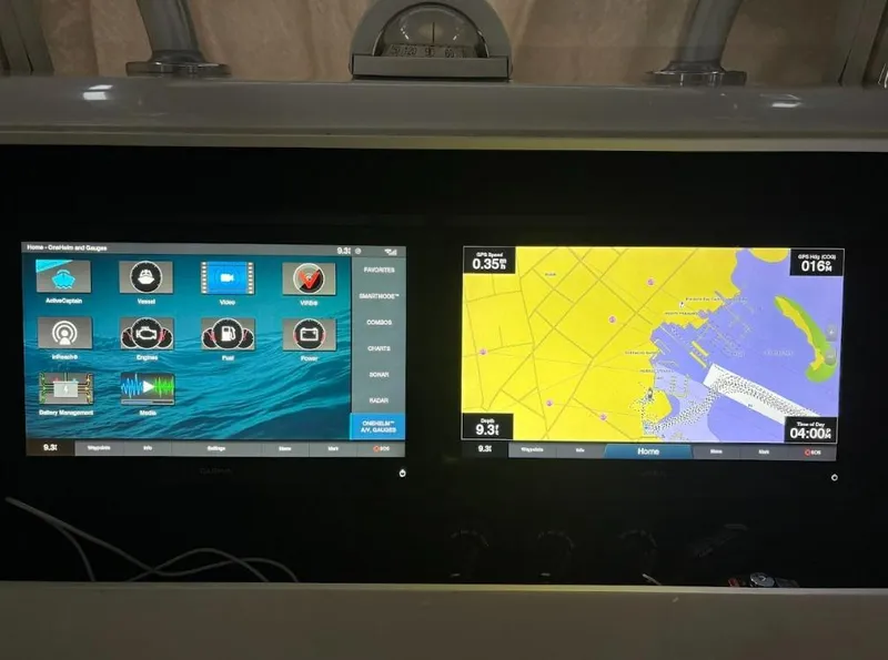 Slide: The Image of Dashboard of a 2020 SeaVee 340Z boat with navigation and control screens. - 6