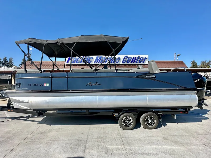 Slide: The Image of 2021 Avalon Catalina Rear Fish 23' boat with 200HP Mercury, parked at Pacific Marine Center. - 1