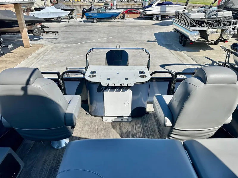 Slide: The Image of 2021 Avalon Catalina Rear Fish 23' boat interior with seating and fishing station. - 10