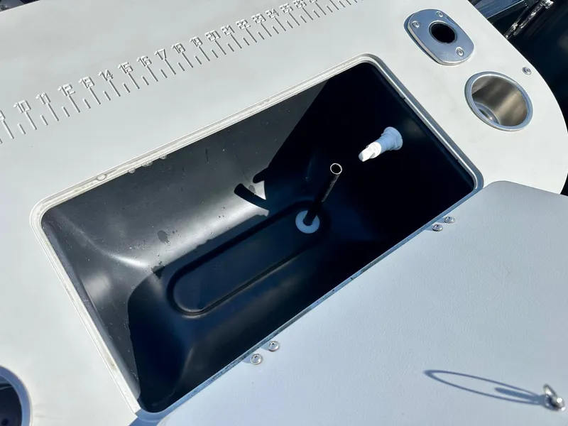 Slide: The Image of Livewell compartment on 2021 Avalon Catalina Rear Fish 23' boat with measurement markings. - 11
