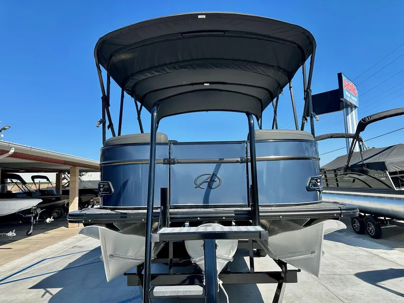Slide: The Image of 2021 Avalon Catalina Rear Fish 23' pontoon boat with 200HP Mercury, displayed outdoors. - 14