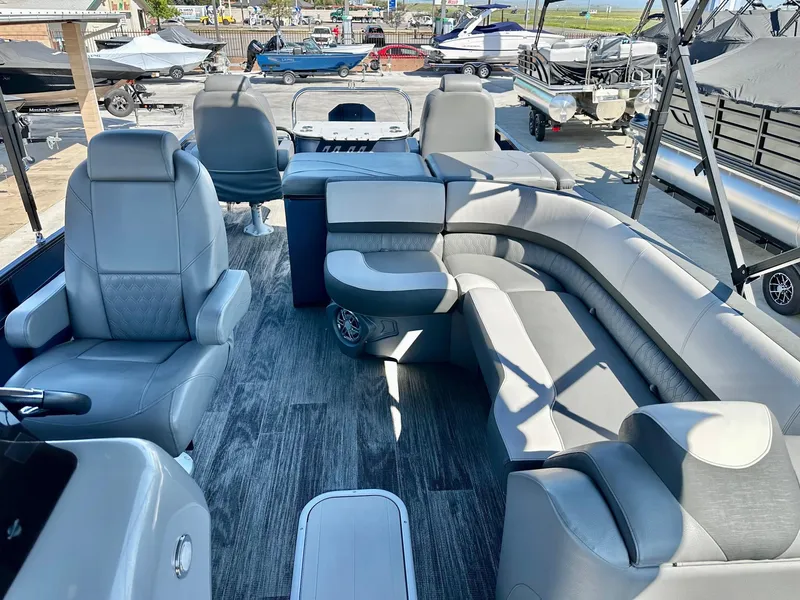 Slide: The Image of 2021 Avalon Catalina Rear Fish 23' boat interior with luxurious seating and modern design. - 17