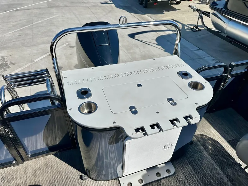Slide: The Image of 2021 Avalon Catalina Rear Fish 23' boat with 200HP Mercury engine, featuring a sleek fishing station. - 19