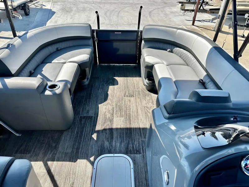 Slide: The Image of 2021 Avalon Catalina Rear Fish 23' boat interior with plush seating and modern design. - 23