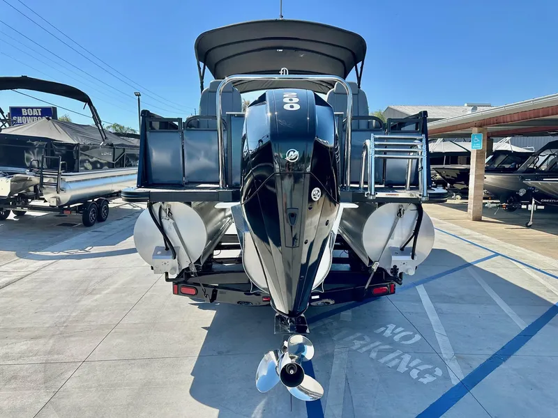 Slide: The Image of 2021 Avalon Catalina Rear Fish 23' with 200HP Mercury engine, displayed at a boat showroom. - 5