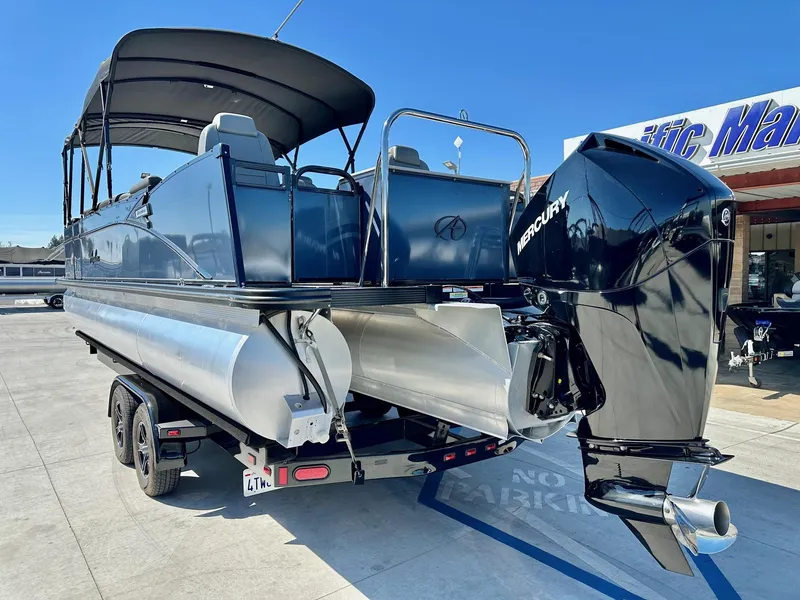 Slide: The Image of 2021 Avalon Catalina Rear Fish 23' pontoon with 200HP Mercury engine on trailer. - 7