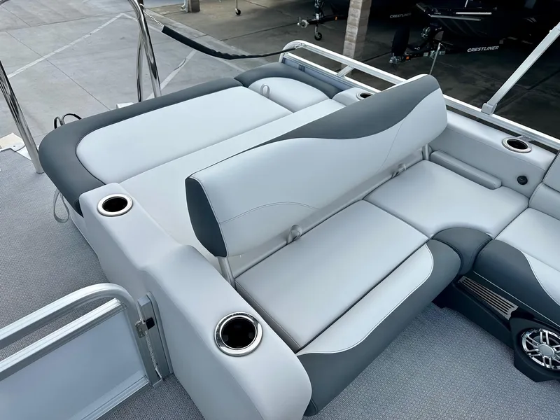 Slide: The Image of 2025 Avalon 25' LSZ Platinum boat with versatile rear bench seating and cup holders. - 13
