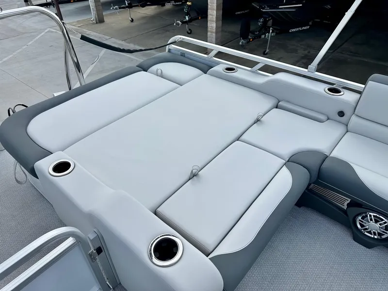 Slide: The Image of 2025 Avalon 25' LSZ Platinum boat with versatile rear bench seating and cup holders. - 15