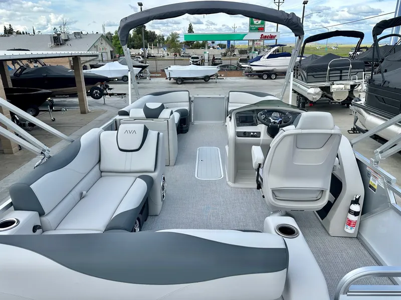Slide: The Image of 2025 Avalon 25' LSZ Platinum boat with versatile rear bench and 225HP Mercury engine. - 16