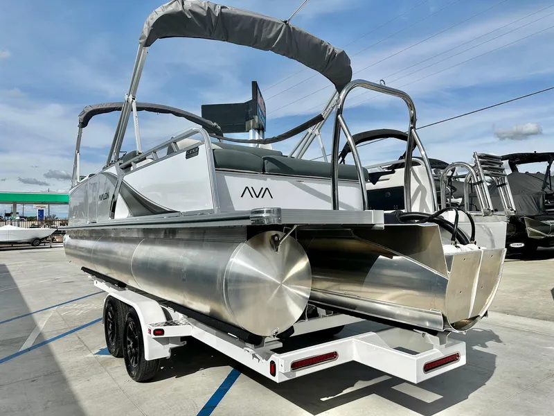 Slide: The Image of 2025 Avalon 25' LSZ Platinum pontoon boat with 225HP Mercury engine, versatile rear bench. - 3