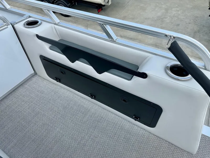 Slide: The Image of 2025 Avalon 25' LSZ Platinum boat interior with versatile rear bench and cup holders. - 6