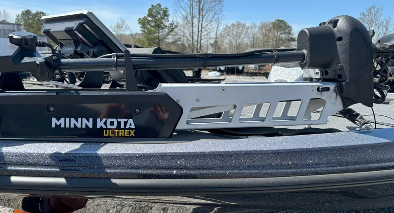 Slide: The Image of Minn Kota Ultrex motor on Falcon F20 Predator boat, 2023 model, outdoors. - 4
