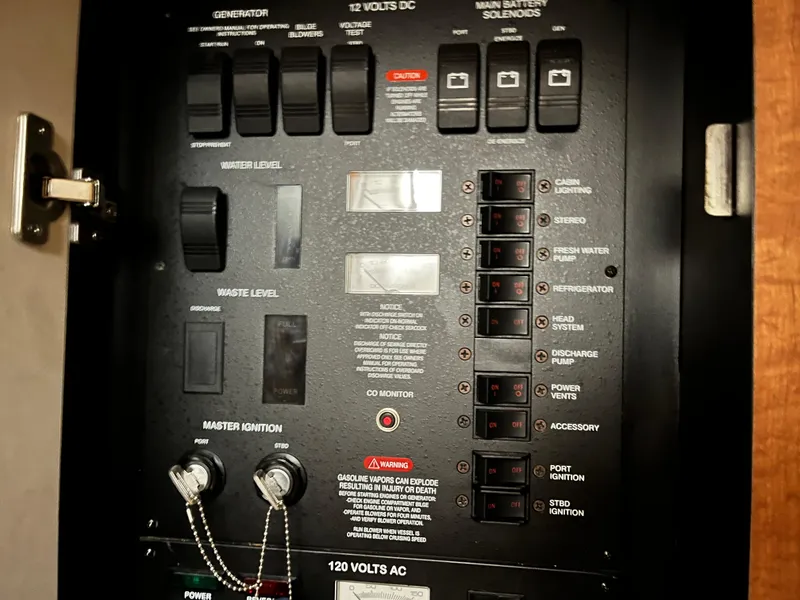 Slide: The Image of Electrical control panel on a 2006 Sea Ray 340 Sundancer boat. - 25
