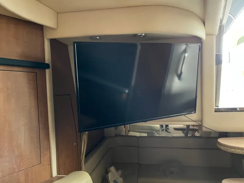 Slide: The Image of Interior of 2006 Sea Ray 340 Sundancer with mounted flat-screen TV. - 27