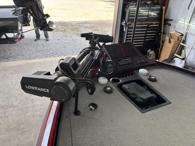 Slide: The Image of 2024 Nitro Z20 Pro boat with Lowrance electronics and trolling motor in a garage setting. - 15