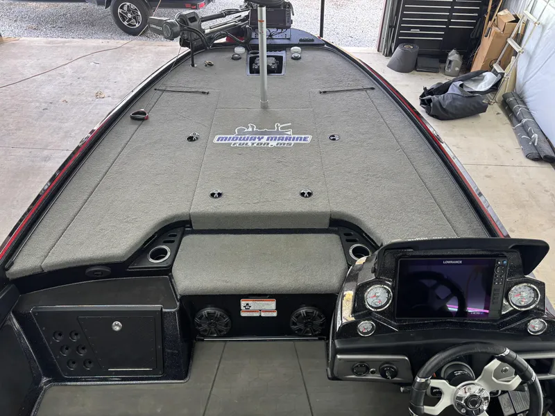 Slide: The Image of 2024 Nitro Z20 Pro boat interior with advanced dashboard and fishing equipment. - 6