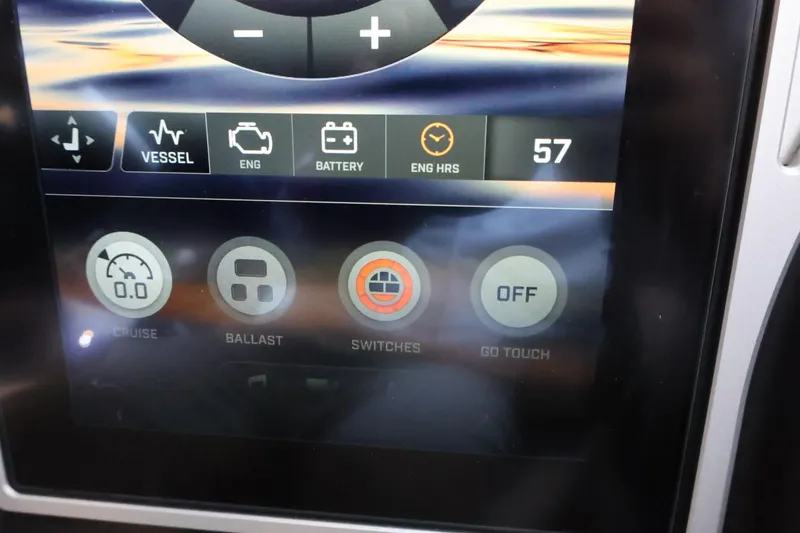 Slide: The Image of Touchscreen display of a 2021 Tigé Z3 boat showing vessel controls and engine hours. - 21