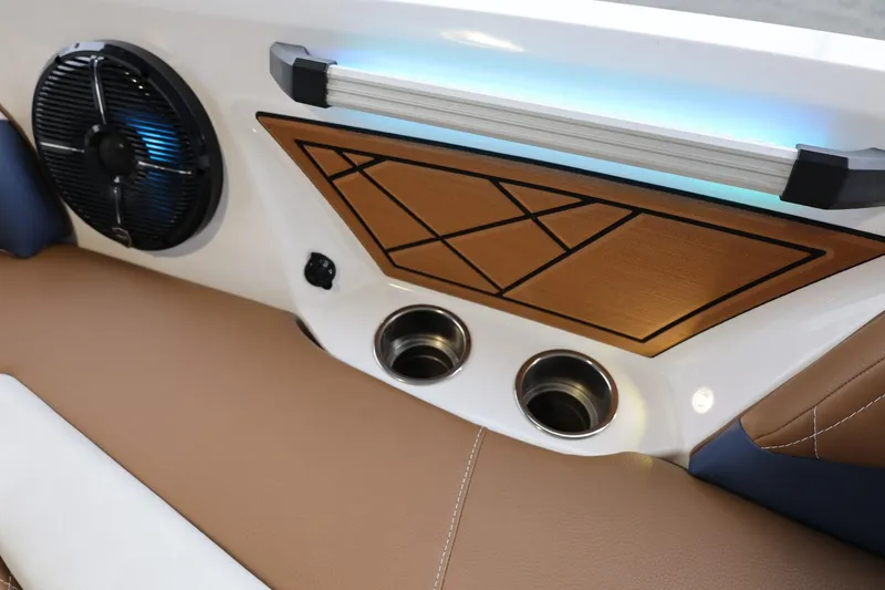 Slide: The Image of Interior of 2021 Tigé Z3 boat with speaker, cup holders, and stylish panel design. - 37