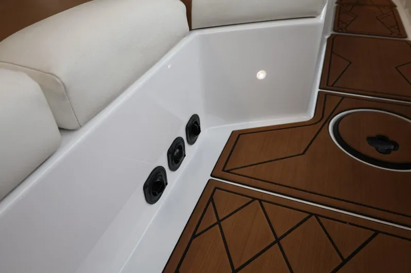 Slide: The Image of 2021 Tigé Z3 boat interior with cushioned seating and stylish wood-patterned flooring. - 39