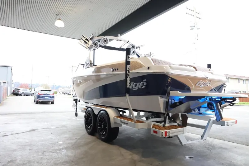 Slide: The Image of 2021 Tigé Z3 boat on trailer in a covered area, rear view. - 6