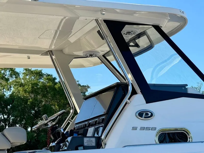 Slide: The Image of 2024 Pursuit S 358 Sport boat helm with sleek design and modern features. - 29