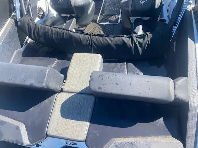 Slide: The Image of Interior of 2022 Scarab 195 ID boat with cushioned seating and modern design. - 14