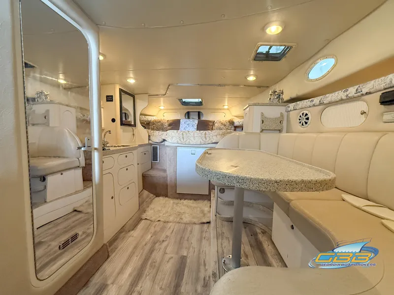 Slide: The Image of Interior of 2000 Rinker 340 Fiesta Vee yacht with cozy seating and modern amenities. - 30
