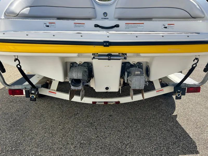 Slide: The Image of Rear view of 2006 Yamaha Boats SR 210 on trailer, showing dual engines. - 12