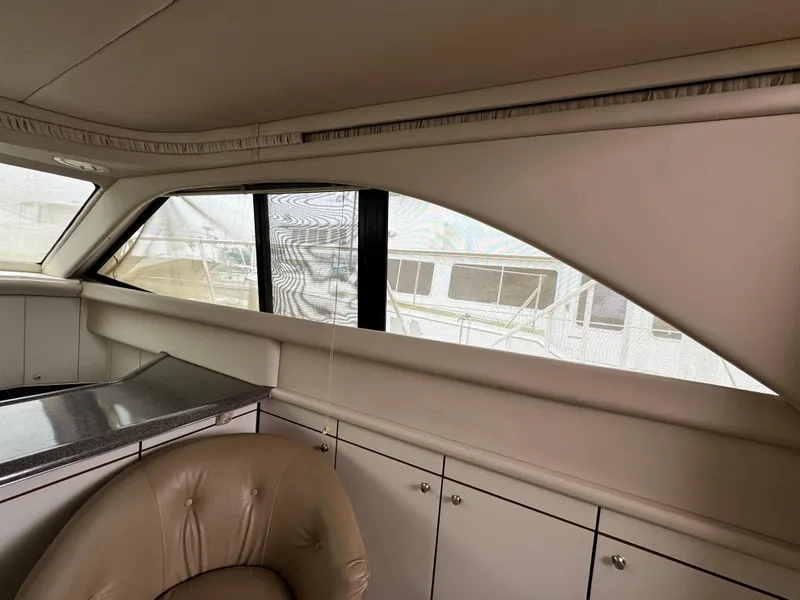Slide: The Image of Interior of 1998 Sea Ray 370 Aft Cabin yacht with elegant seating and cabinetry. - 36