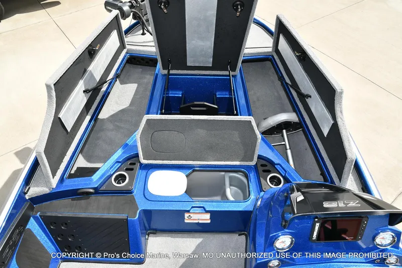 Slide: The Image of 2023 Nitro Z18 Pro boat interior with open storage compartments and sleek blue design. - 10