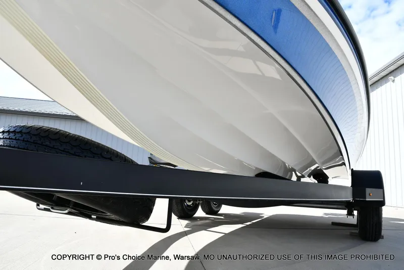 Slide: The Image of 2023 Nitro Z18 Pro boat on trailer, showcasing sleek hull design and blue accents. - 36