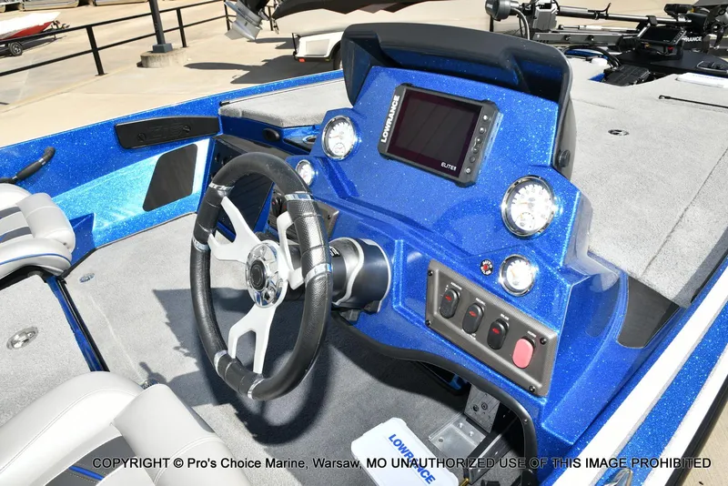 Slide: The Image of 2023 Nitro Z18 Pro boat dashboard with steering wheel and control panel. - 40