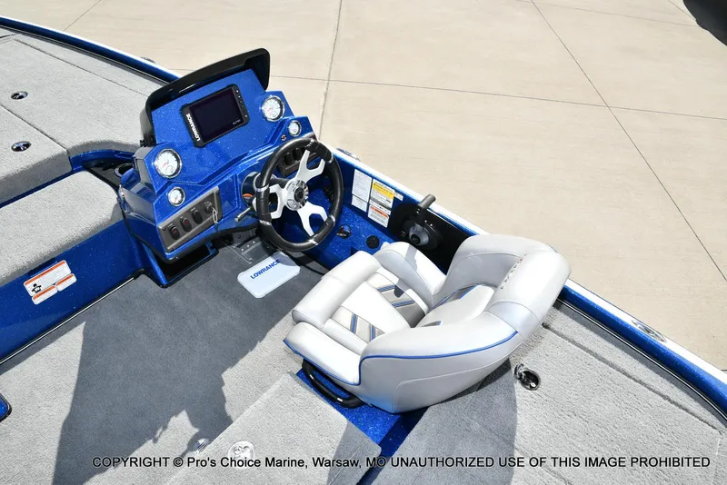 Slide: The Image of 2023 Nitro Z18 Pro boat interior with steering wheel and control panel. - 44