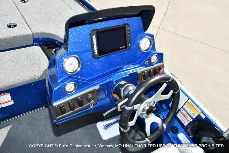 Slide: The Image of 2023 Nitro Z18 Pro boat dashboard with steering wheel and control panel. - 45