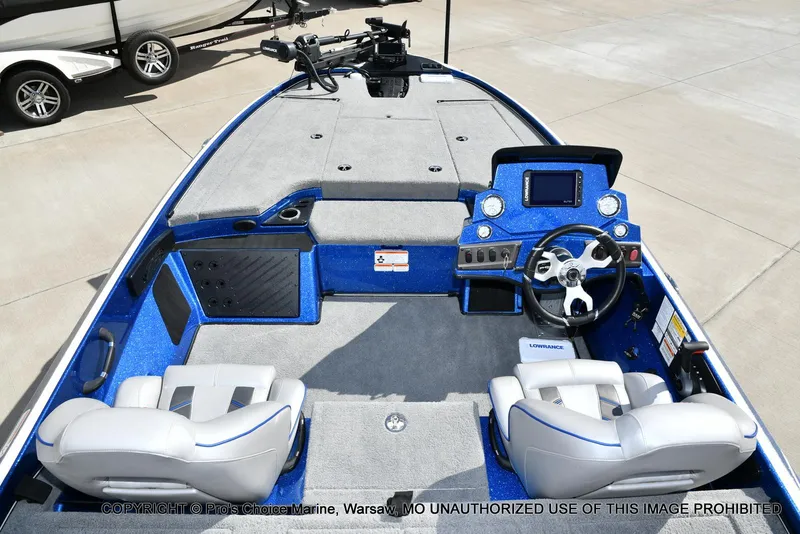 Slide: The Image of 2023 Nitro Z18 Pro boat interior with steering wheel and control panel. - 9