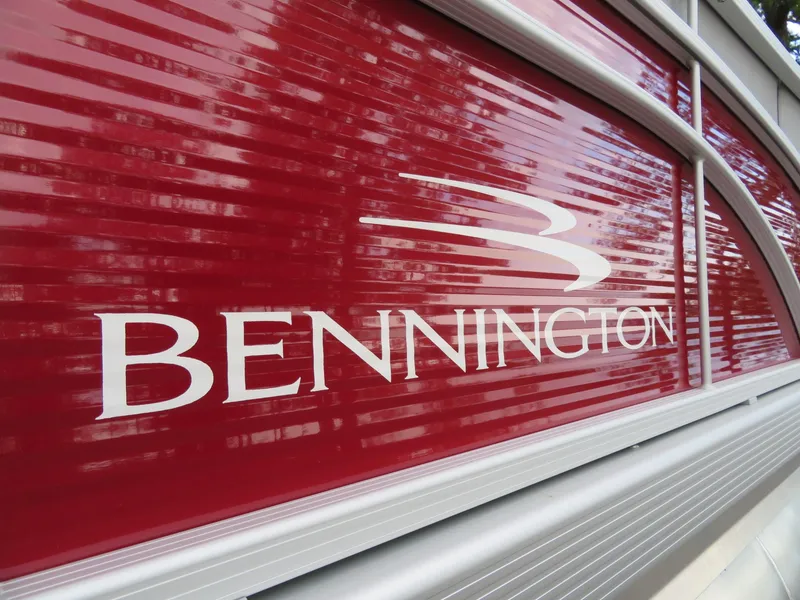 Slide: The Image of Red 2021 Bennington 20SLV boat with logo on side panel. - 7