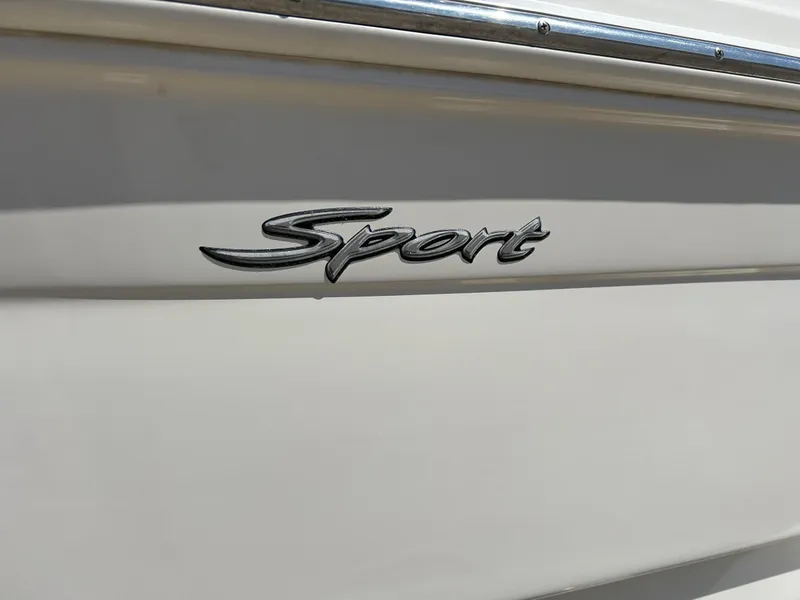 Slide: The Image of 2005 Sea Ray 200SP boat with "Sport" emblem on the side. - 6