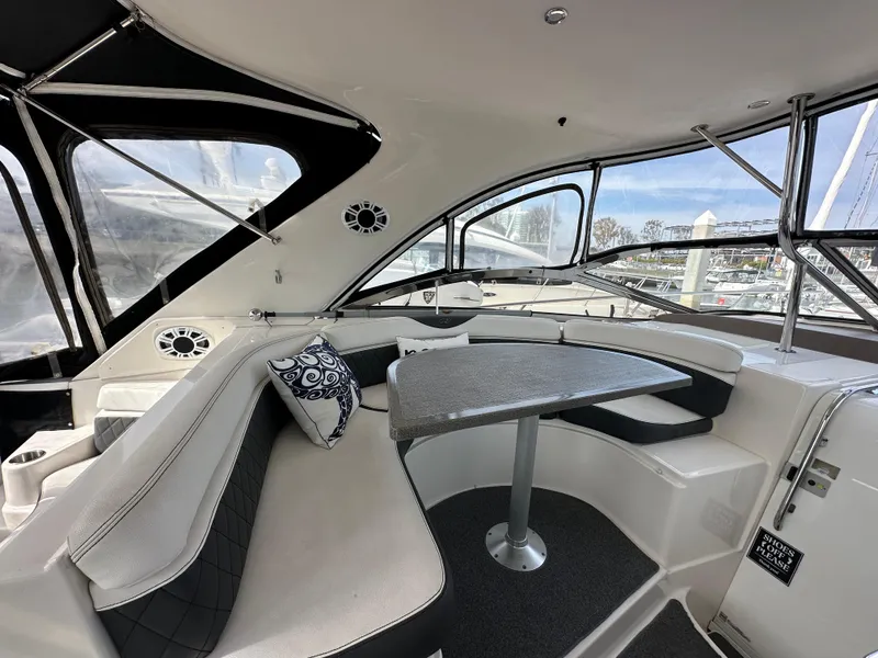 Slide: The Image of Interior of 2005 Regal 4260 COMMODORE yacht with seating and table. - 14