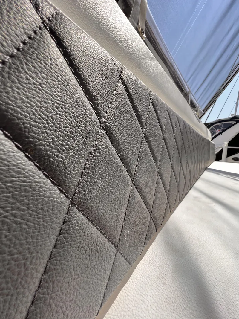 Slide: The Image of Diamond-stitched upholstery on 2005 Regal 4260 COMMODORE boat, showcasing luxury design. - 16