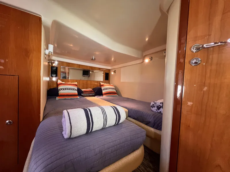 Slide: The Image of Luxurious cabin interior of 2005 Regal 4260 COMMODORE yacht with twin beds. - 47