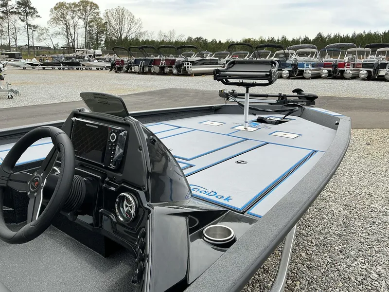 Slide: The Image of 2025 Xpress Hyper-Lift Crappie Series H20 boat with advanced dashboard and fishing equipment. - 9