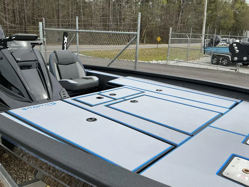 Slide: The Image of 2025 Xpress Hyper-Lift Crappie Series H20 boat with sleek deck design and comfortable seating. - 5