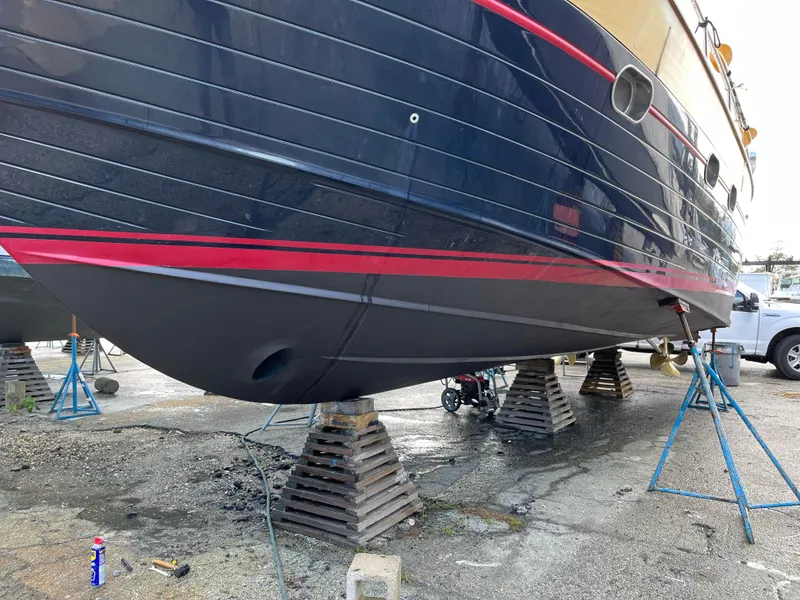 Slide: The Image of 2005 Apreamare Don Giovanni yacht on stands, showcasing hull design and maintenance setup. - 23