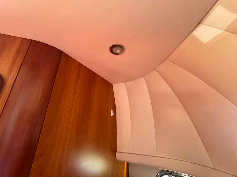 Slide: The Image of Interior view of 2005 Apreamare Don Giovanni yacht with wood and leather finishes. - 24