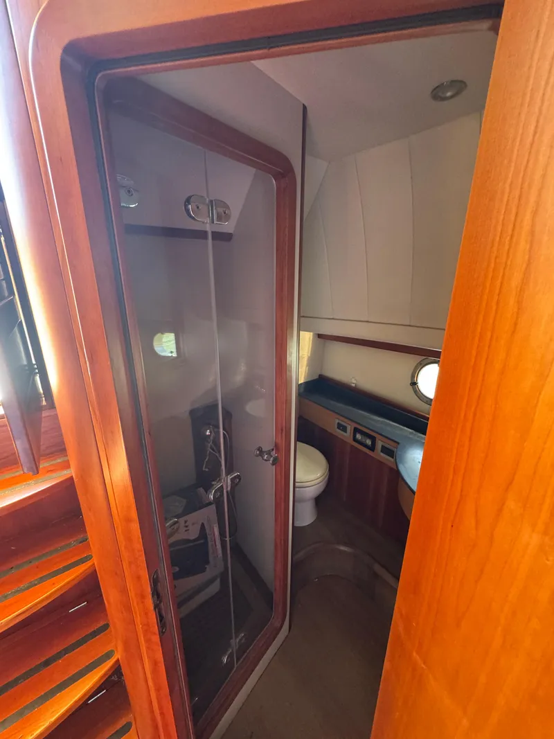 Slide: The Image of 2005 Apreamare Don Giovanni yacht bathroom with wooden accents and modern fixtures. - 28
