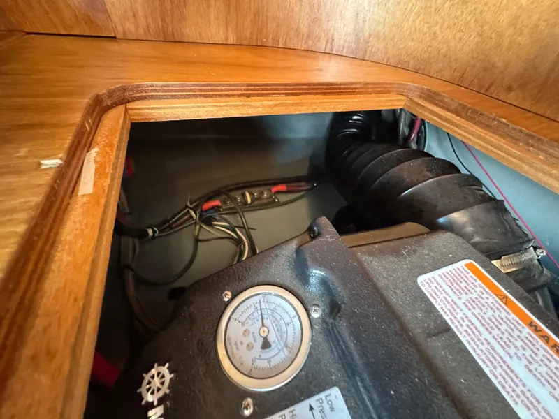 Slide: The Image of 2005 Apreamare Don Giovanni engine compartment with visible wiring and gauge. - 33