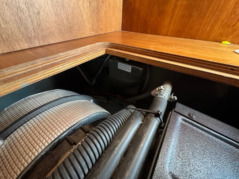 Slide: The Image of Engine compartment of a 2005 Apreamare Don Giovanni boat, showcasing mechanical components. - 34