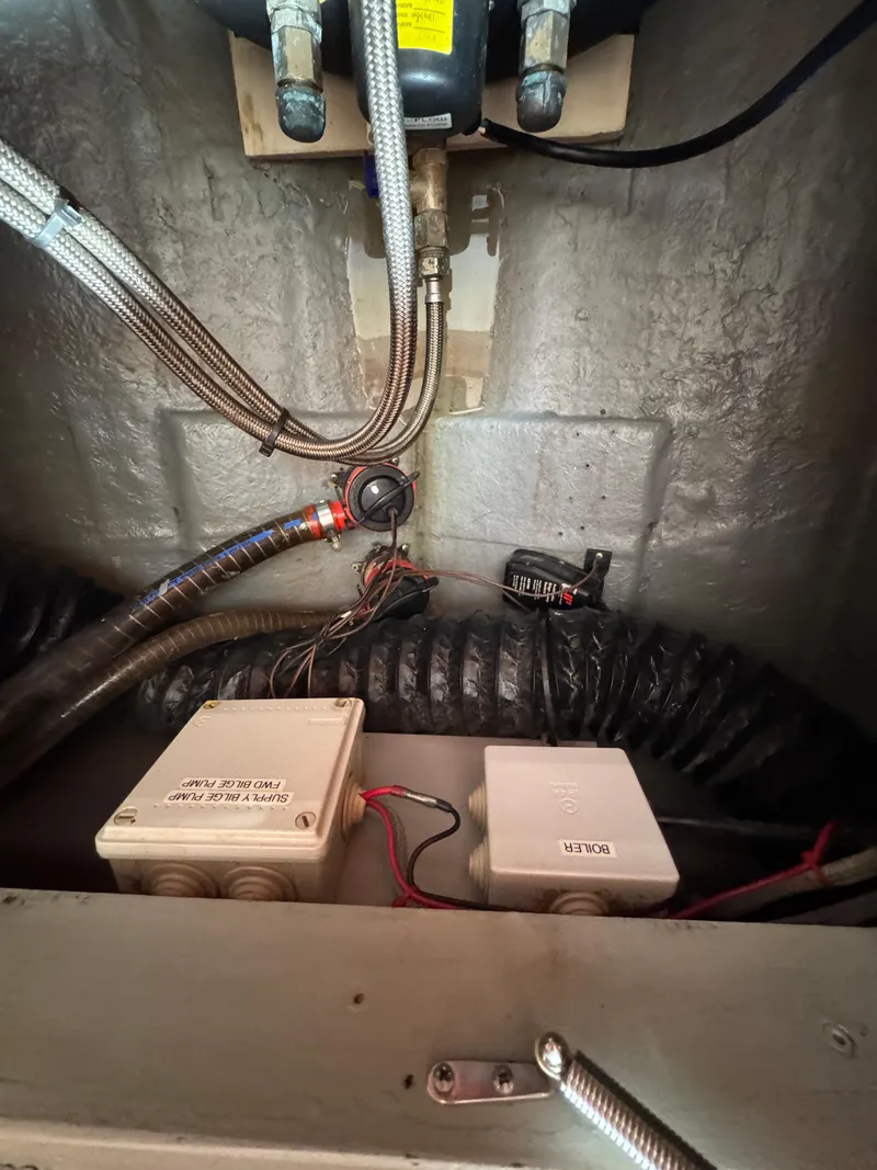 Slide: The Image of 2005 Apreamare Don Giovanni boat engine compartment with wiring and components. - 45