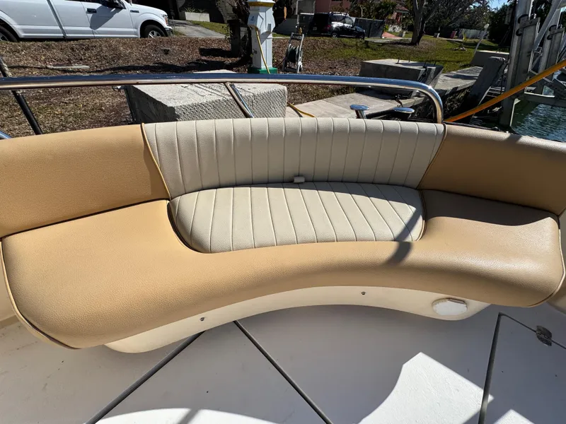 Slide: The Image of 2005 Apreamare Don Giovanni boat with beige and cream seating on deck. - 6