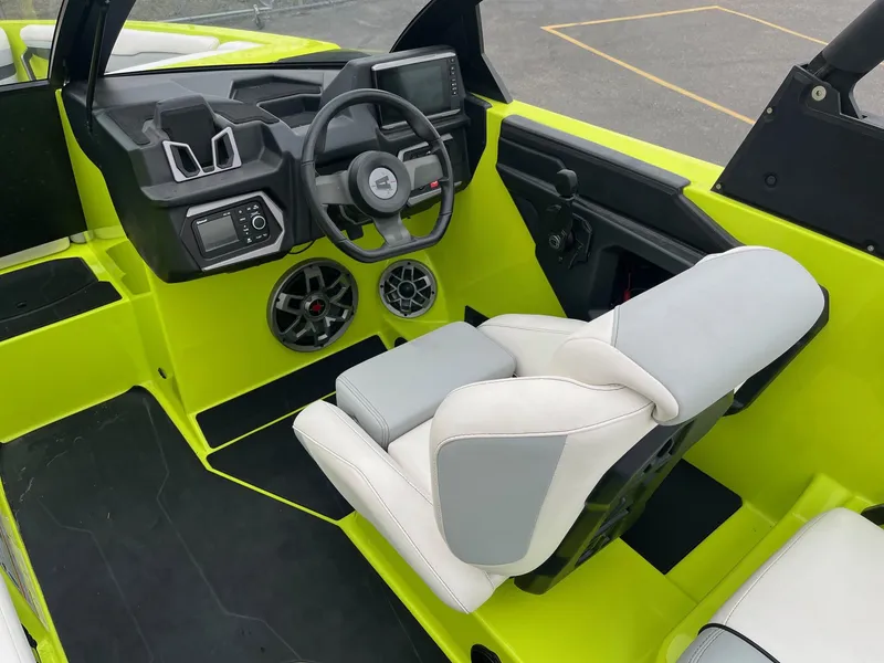 Slide: The Image of 2023 Axis T220 boat interior with modern dashboard and steering wheel. - 27